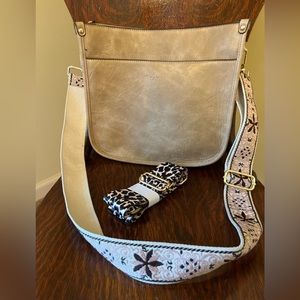 Tan crossbody purse.